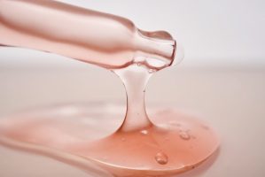 Pipette,With,A,Viscous,Pink,Cosmetic,Close-up.